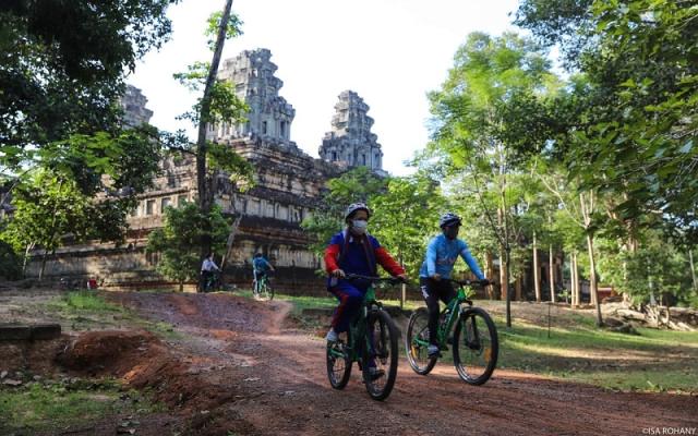 More Tourists Cycle to Visit Temples In Cambodia's Angkor Complex