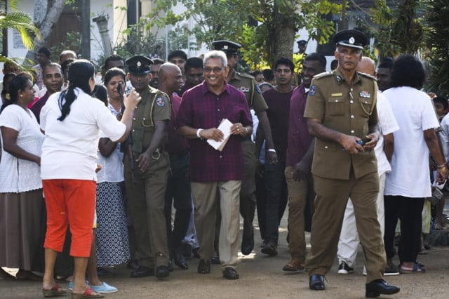 Rajapaksas eye comeback in tense Sri Lanka election Rajapaksas eye comeback in tense Sri Lanka election