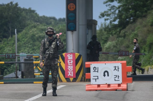 North Korea's Kim suspends military plans against South: KCNA North Korea's Kim suspends military plans against South: KCNA
